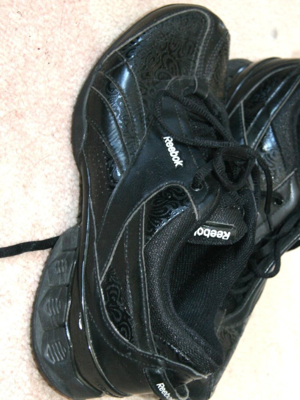 Black Reebok sneakers